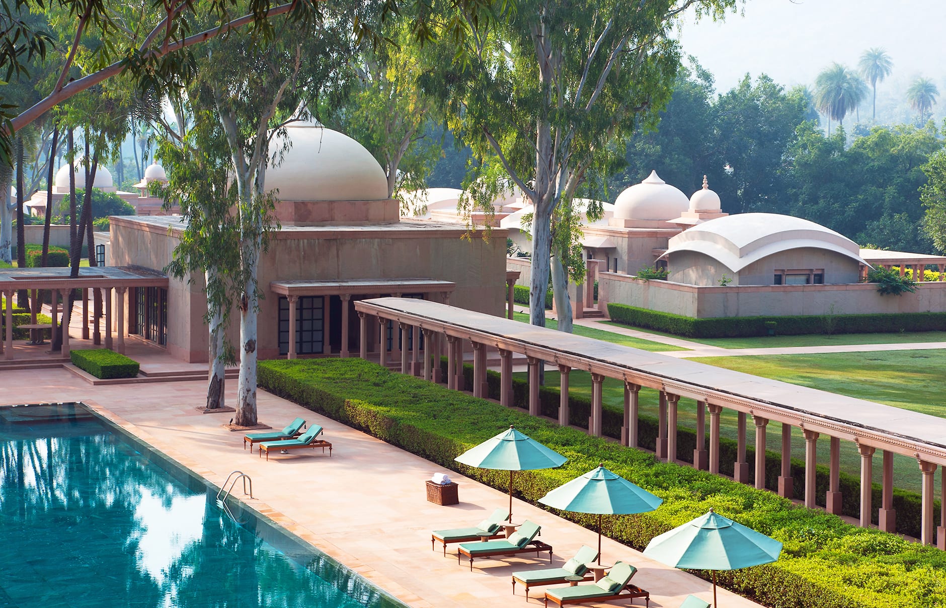 Poolside Loungers. Amanbagh, Alwar, Rajasthan, India. Luxury Hotel Review by TravelPlusStyle. Photo © Aman Resorts