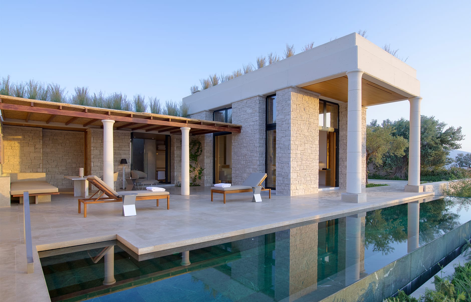 Amanzoe, Porto Heli, Peloponnese, Greece. Luxury Hotel Review by TravelPlusStyle. © Aman Resorts