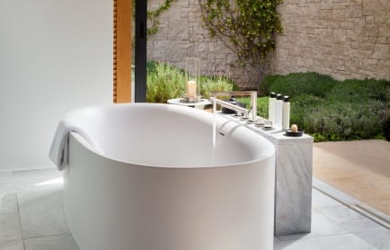 amanzoe-greece-villa-master-bedroom-and-bathroom_original_6759