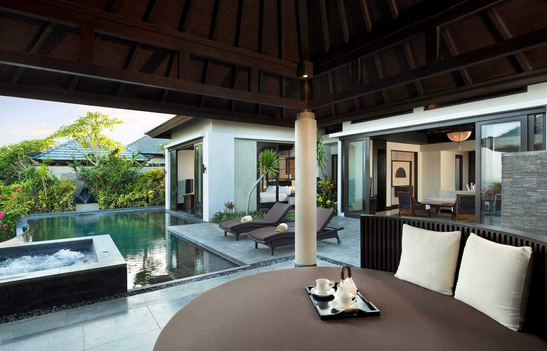 Umana Bali, LXR Hotels & Resorts, Bali, Indonesia. Hotel Review by TravelPlusStyle. Photo © Hilton 70603328-h1-pool_villa_garden_exterior
