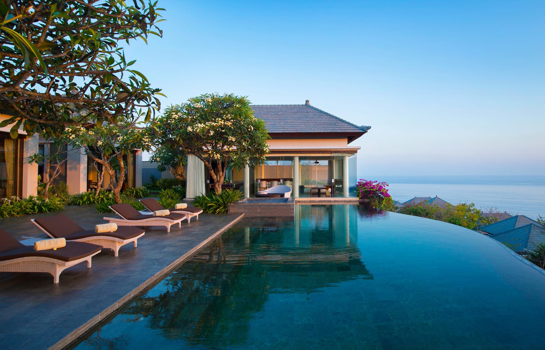 Umana Bali, LXR Hotels & Resorts, Bali, Indonesia. Hotel Review by TravelPlusStyle. Photo © Hilton 70604530-h1-pres_suite_exterior_sunset