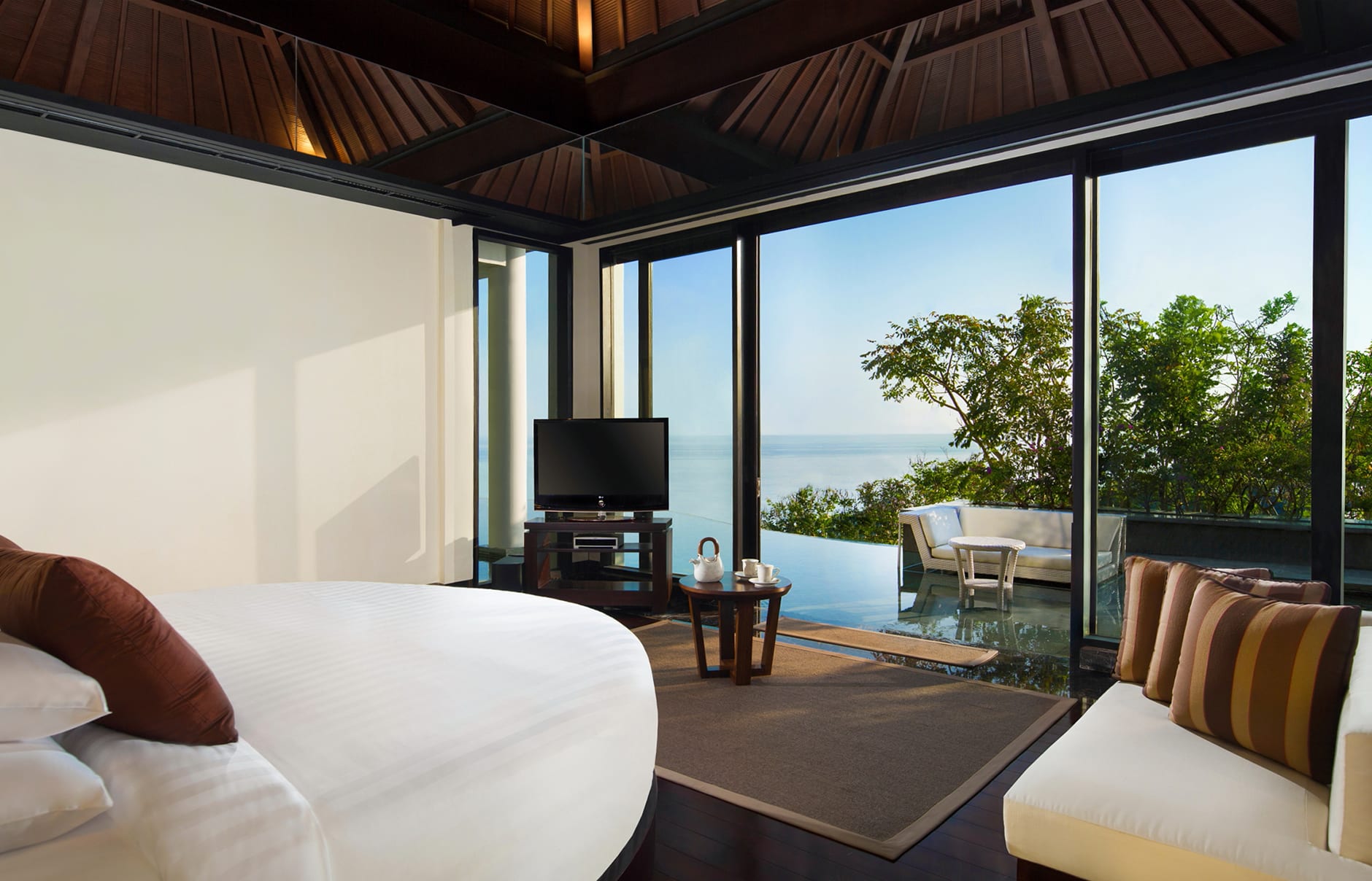 Umana Bali, LXR Hotels & Resorts, Bali, Indonesia. Hotel Review by TravelPlusStyle. Photo © Hilton 70604541-h1-pres_suite_master_bedroom