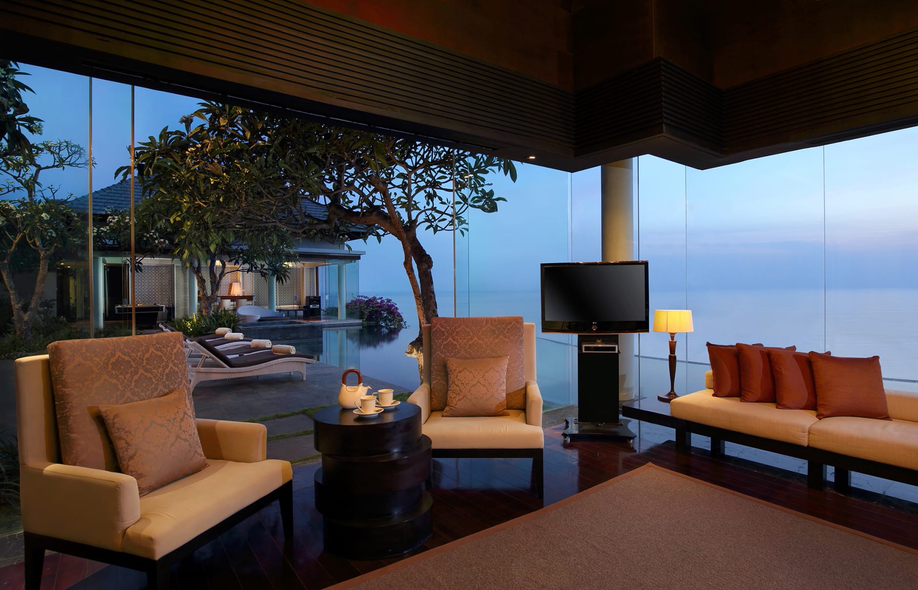 Umana Bali, LXR Hotels & Resorts, Bali, Indonesia. Hotel Review by TravelPlusStyle. Photo © Hilton 70604552-h1-pres_suite_living_room