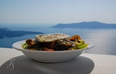 Greek salad in Santorini, Greece. © Travel+Style