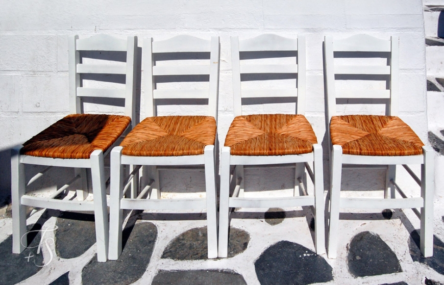 Chairs in Mykonos, Greece. © Travel+Style