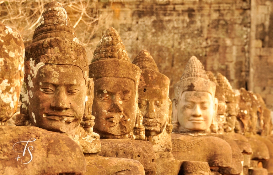 Statues at the South gate of Angkor Thom. ©Travel+Style