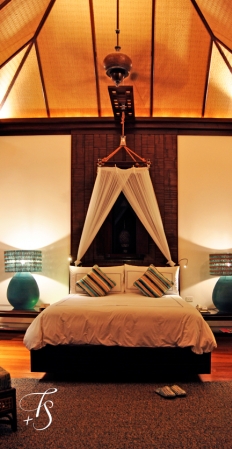 Villa bedroom. Four Seasons Resort Koh Samui. © Travel+Style