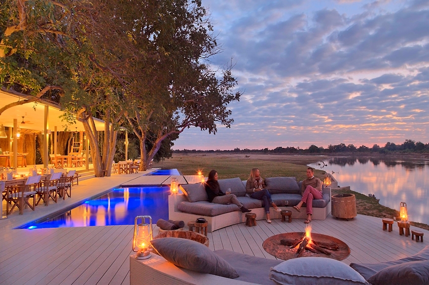 the fire pit. Chinzombo Camp, Zambia. travelplusstyle.com