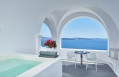 Katikies, Santorini, Greece.  Luxury Hotel Review by TravelPlusStyle. Photo © Katikies