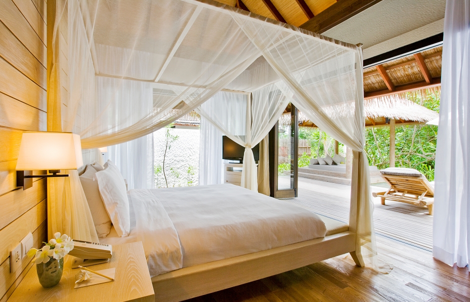 Garden Suite bedroom. COMO Maalifushi, Maldives. Hotel Review by TravelPlusStyle. Photo © COMO Hotels & Resorts