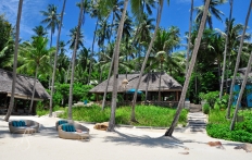 On The Beach. Four Seasons Resort Koh Samui. © Travel+Style