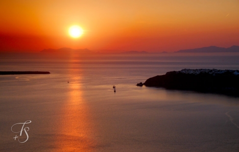 Sunset over the Santorinian caldera, Greece. © Travel+Style