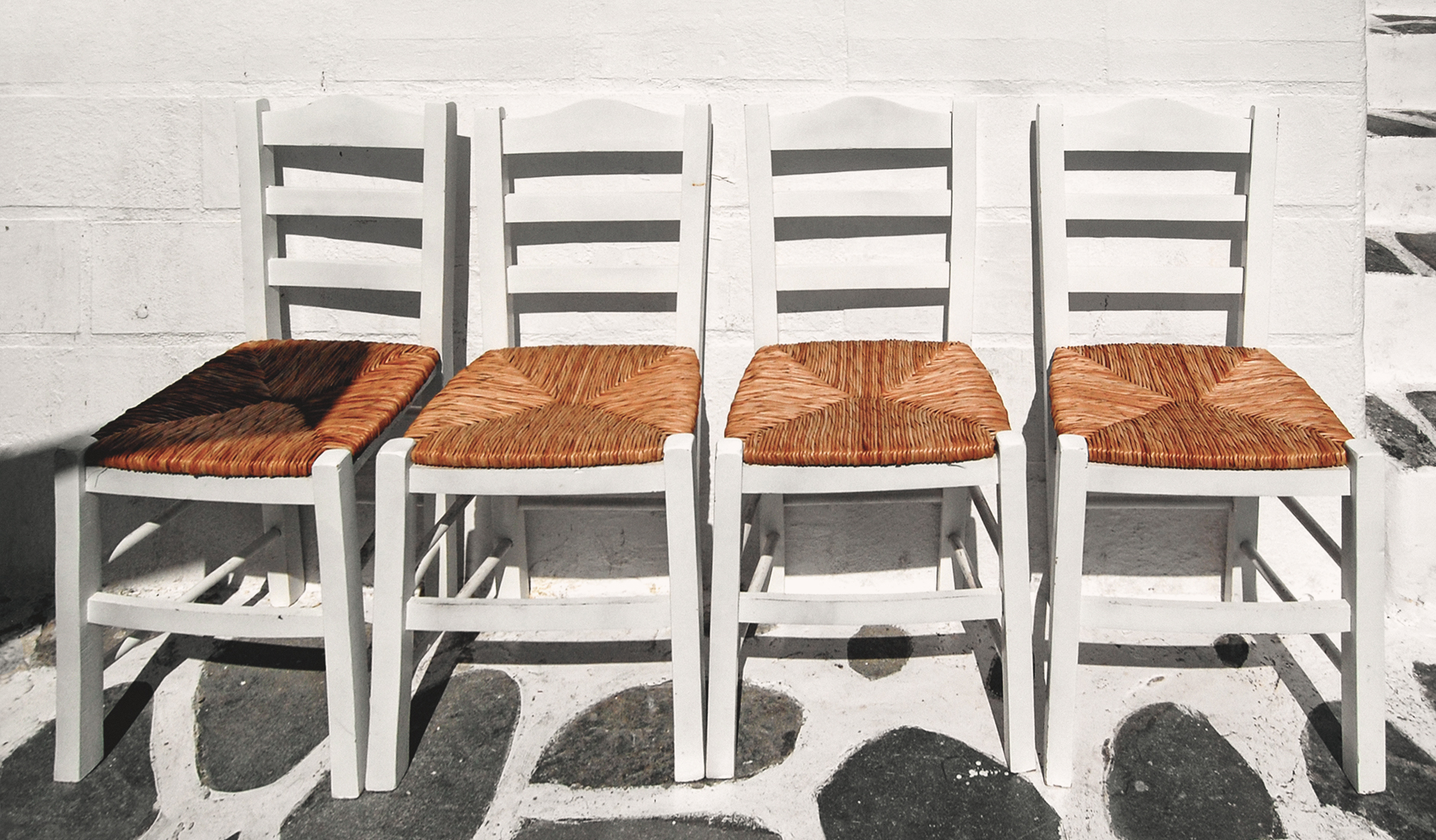 Chairs in Mykonos, Greece • Photo © TravelPlusStyle.com
