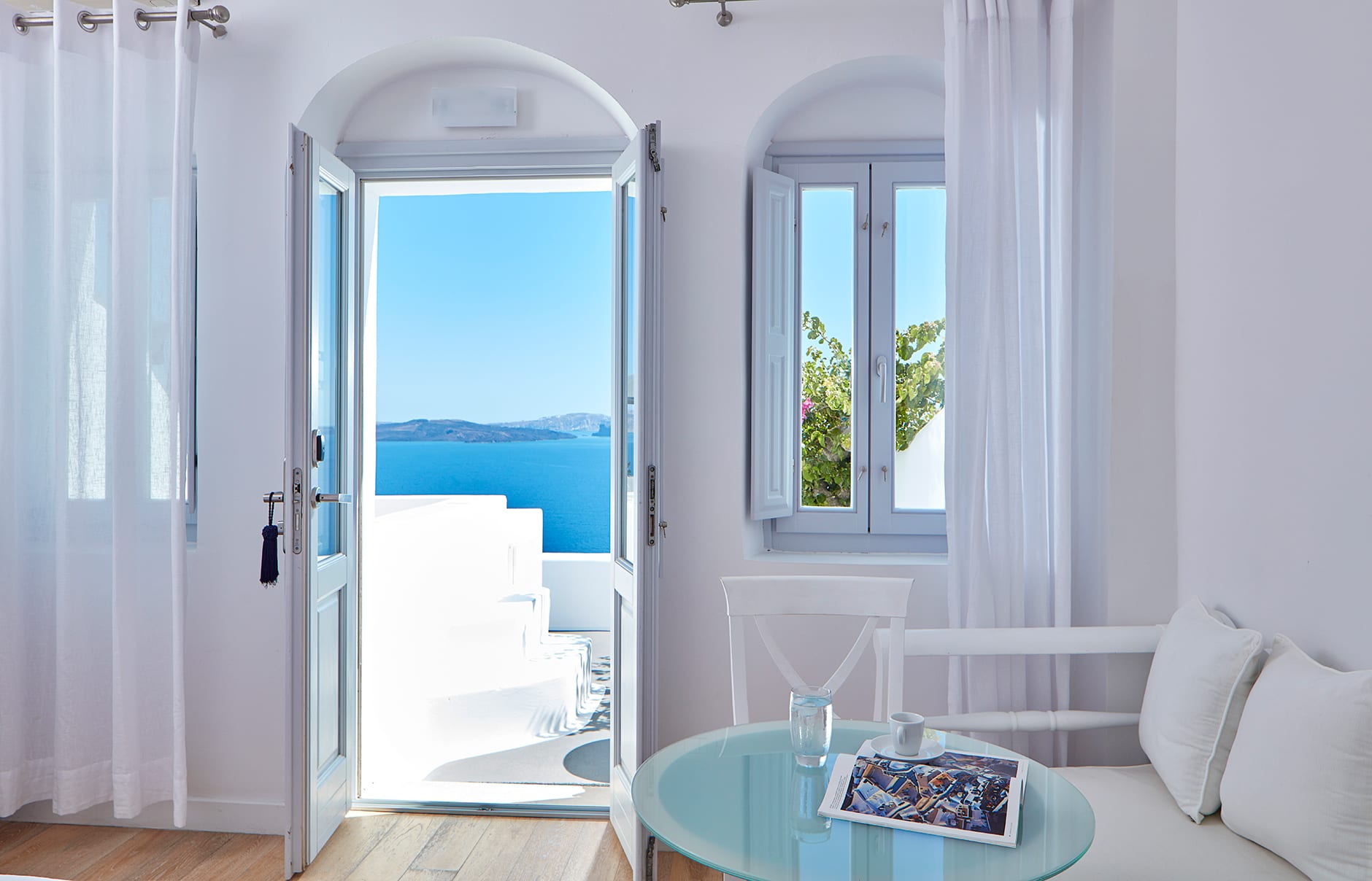 Katikies, Santorini, Greece.  Luxury Hotel Review by TravelPlusStyle. Photo © Katikies