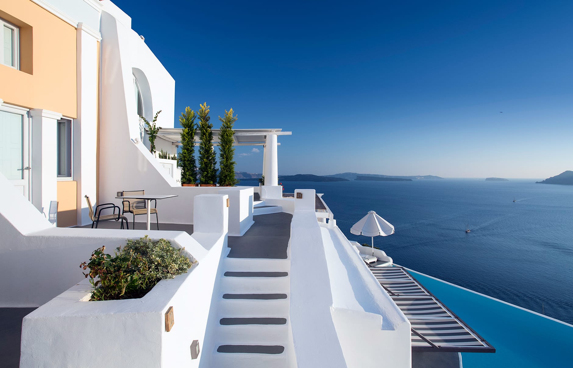 Katikies, Santorini, Greece.  Luxury Hotel Review by TravelPlusStyle. Photo © Katikies