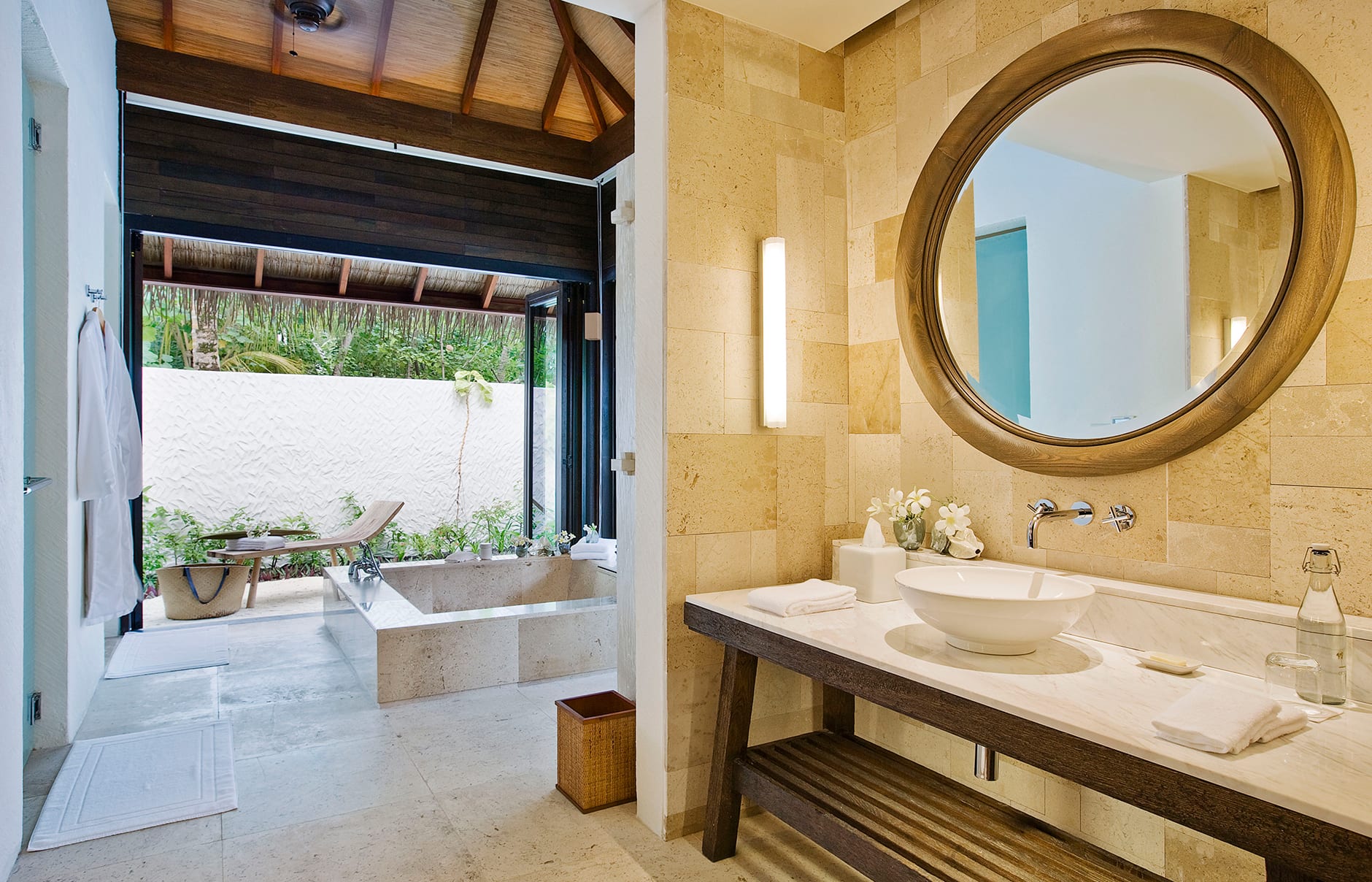 Garden Suite bathroom . COMO Maalifushi, Maldives. Hotel Review by TravelPlusStyle. Photo © COMO Hotels & Resorts