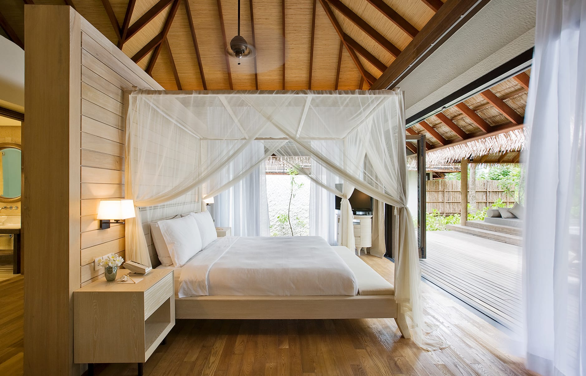 Garden Suite bedroom. COMO Maalifushi, Maldives. Hotel Review by TravelPlusStyle. Photo © COMO Hotels & Resorts