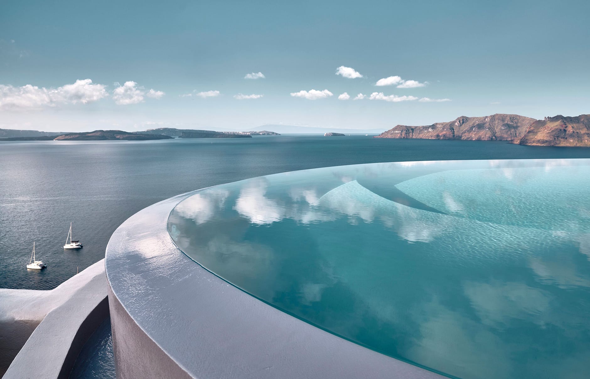 Mystique, Santorini, Greece. Hotel Review by TravelPlusStyle. Photo © Marriott International