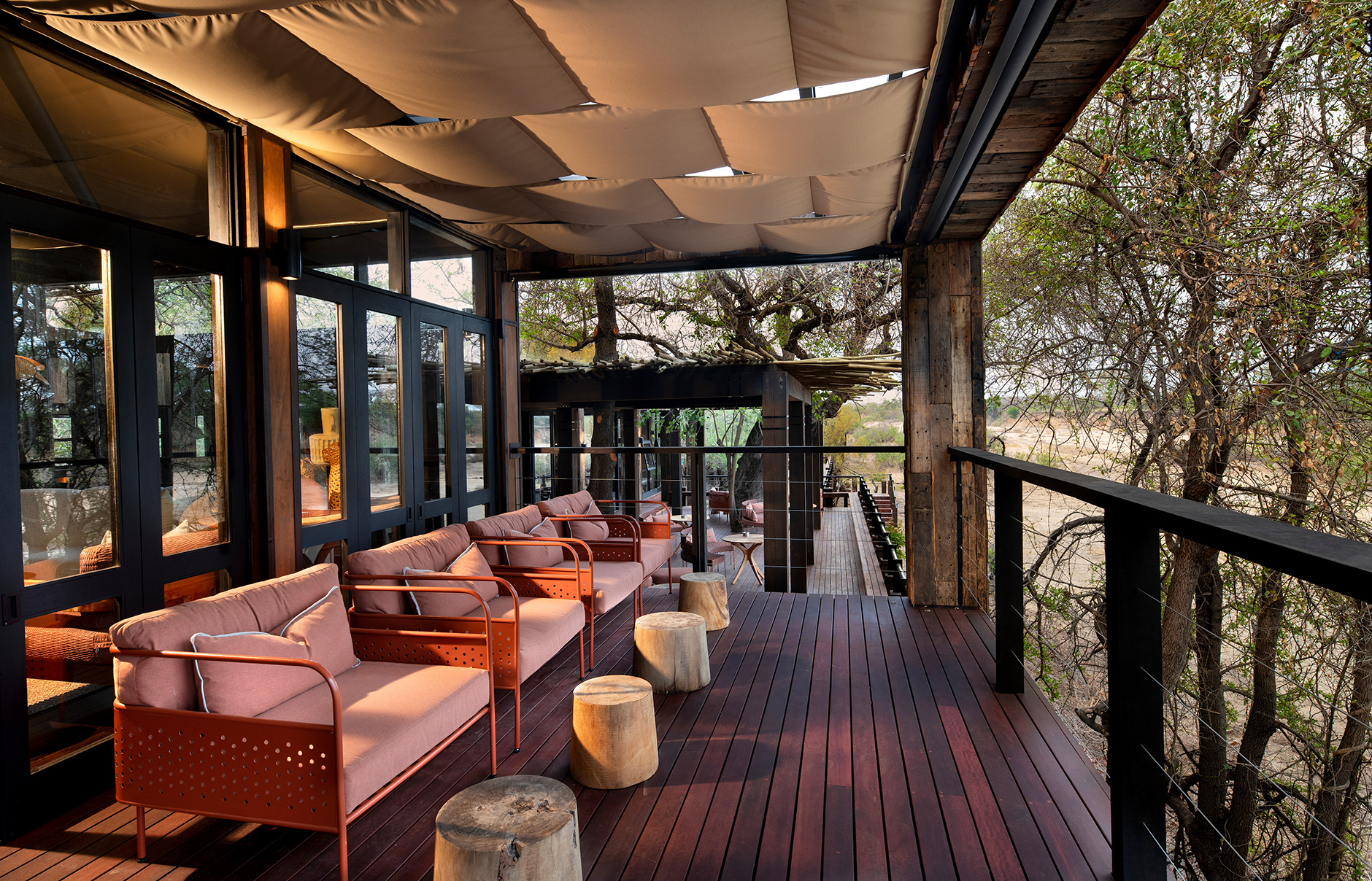 andBeyond Ngala Tented Camp, Kruger National Park, South Africa. Review by TravelPlusStyle. Photo © andBeyond South-Africa-Ngala-Tented-Camp-outside-deck-seating-area