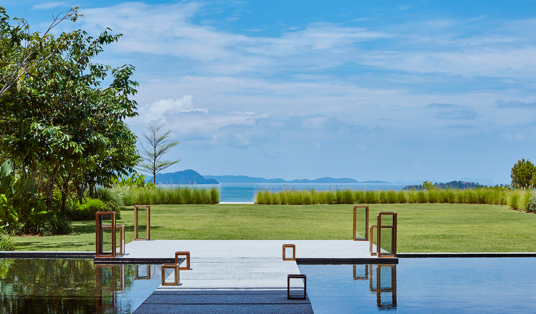 Point Yamu by COMO, Phuket. TravelPlusStyle.com open_lawn_courtyard