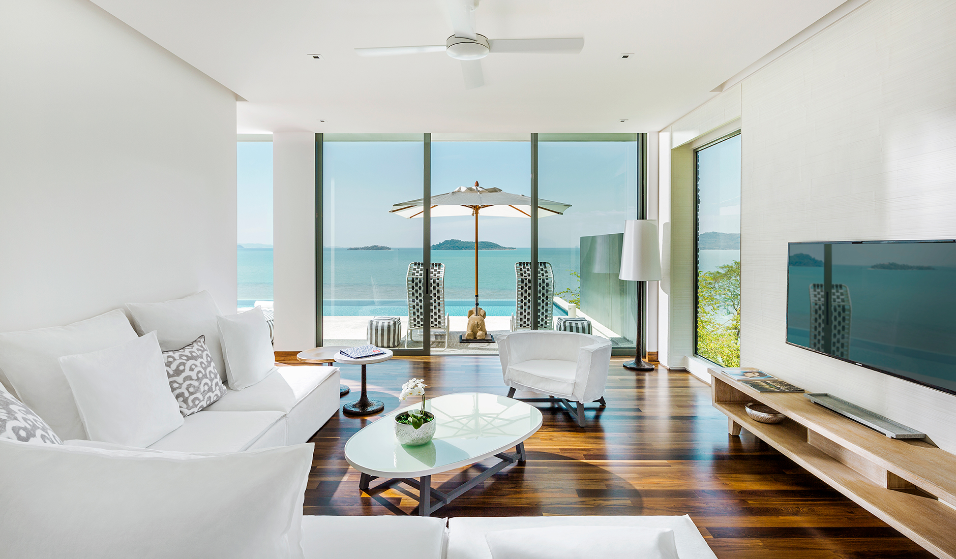 Point Yamu by COMO, Phuket. TravelPlusStyle.com three_bedroom_andaman_pool_villas_living_area