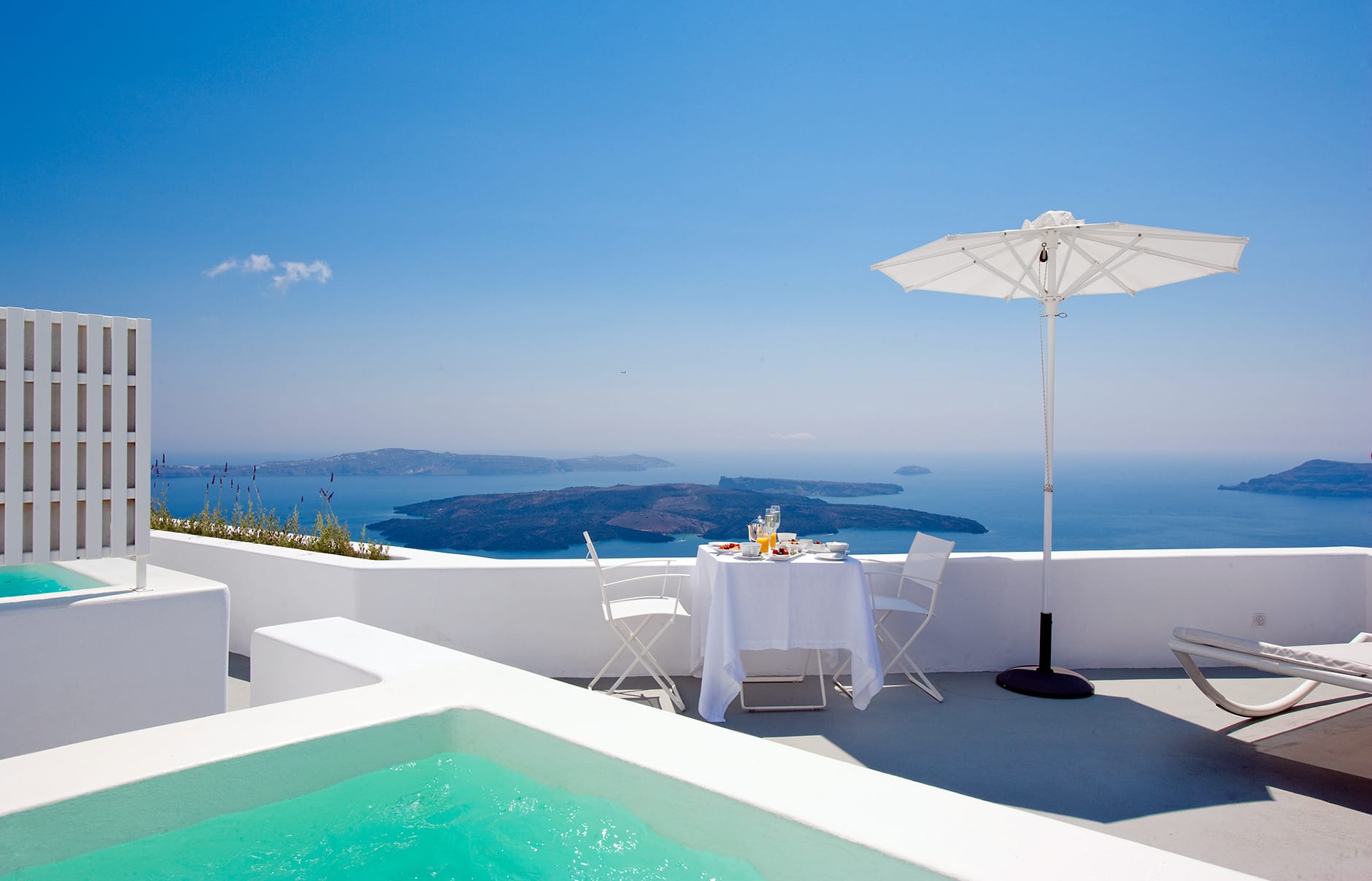 Junior Suite plunge pool. Grace Hotel Santorini, Greece. Luxury Hotel Review by TravelPlusStyle. Photo © Auberge Resorts Collection