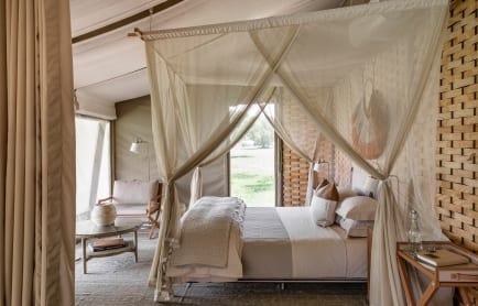 singita-sabora-tented-suite-bedroom-scaled
