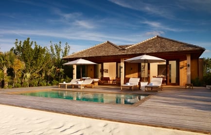 52159399-h1-two_bedroom_beach_house_exterior_1COMO Parrot Cay, Turks &amp; Caicos, Caribbean. Hotel Review by TravelPlusStyle. Photo © COMO Hotels and Resorts