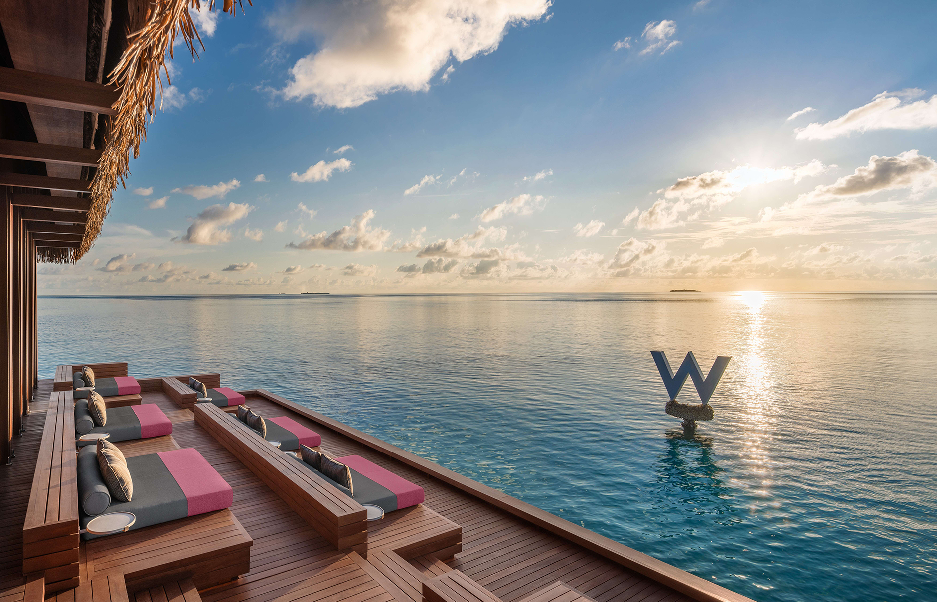 W Maldives, Fesdu Island, Maldives. Hotel Review by TravelPlusStyle. Photo © Marriott International 2who_mlewh_sip_deck_sunset