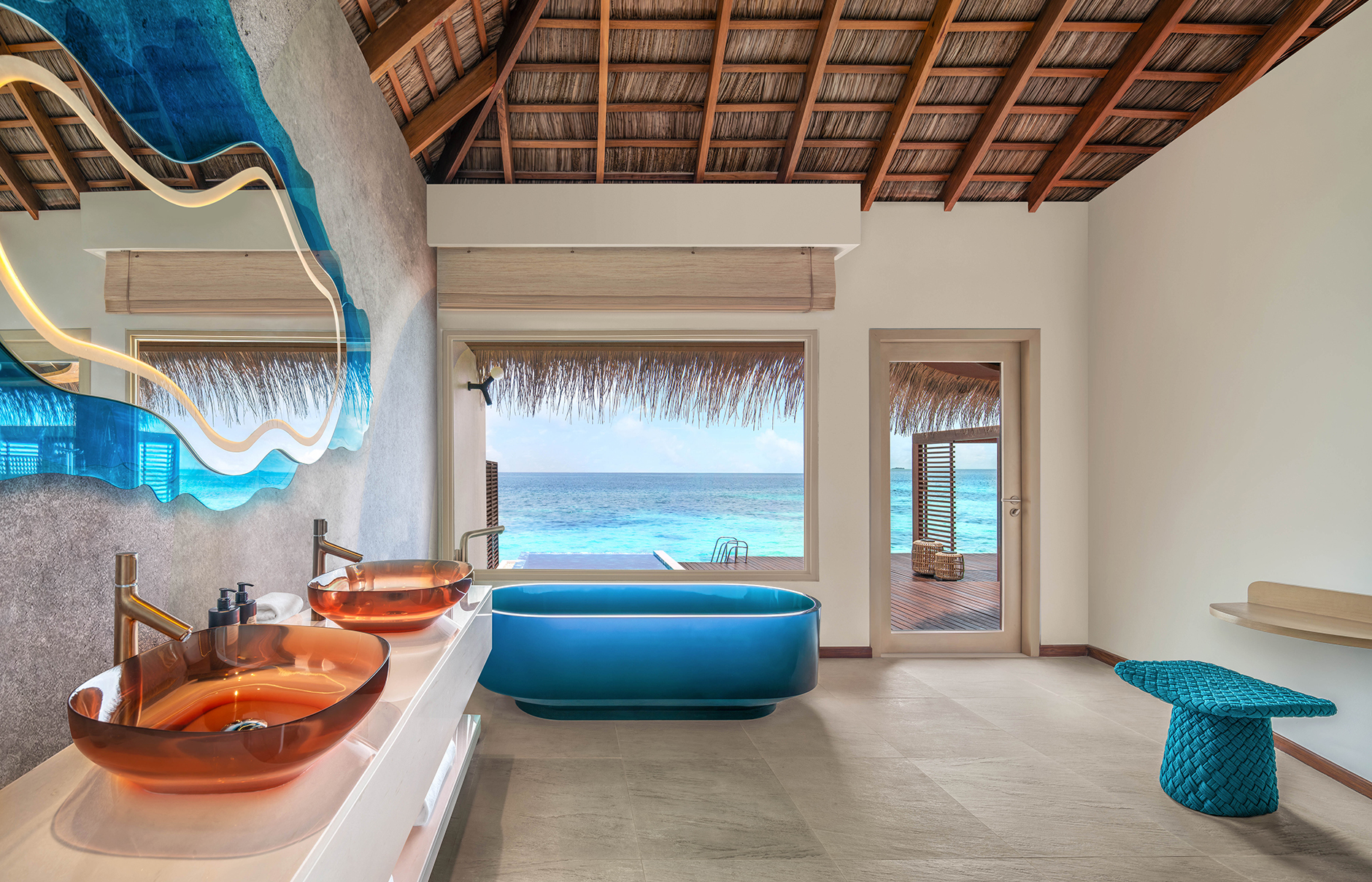 W Maldives, Fesdu Island, Maldives. Hotel Review by TravelPlusStyle. Photo © Marriott International W-Maldives-Premier-Overwater-One-Bedroom-Villa-Bathroom-1