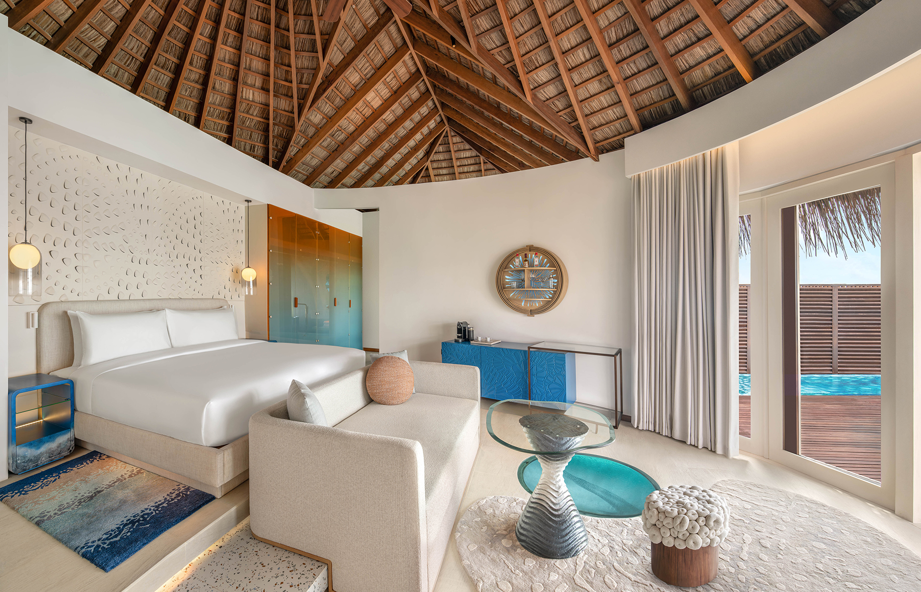 W Maldives, Fesdu Island, Maldives. Hotel Review by TravelPlusStyle. Photo © Marriott International W-Maldives-Premier-Overwater-One-Bedroom-Villa-Bedroom-1
