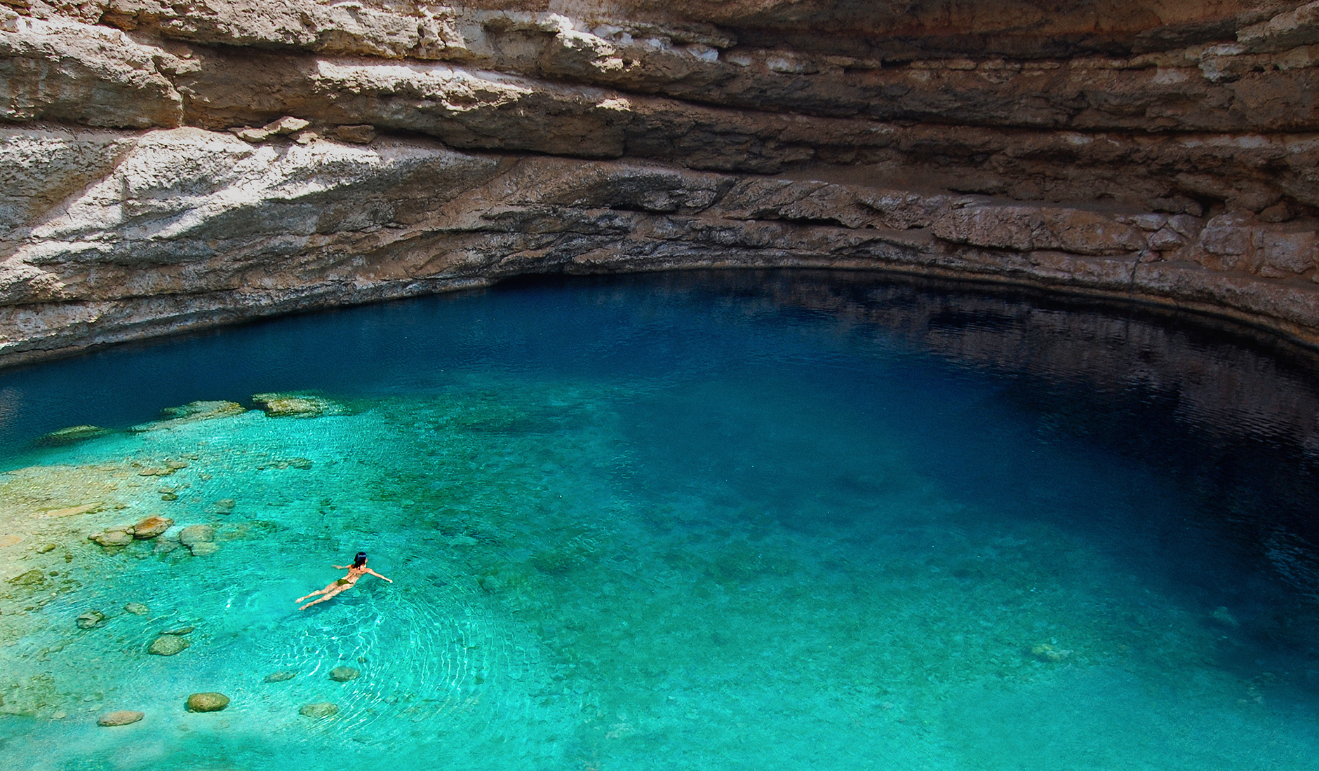 Bimmah Sinkhole, Oman. The Top 10 Things To Do in Oman. Photo by © TravelPlusStyle.com