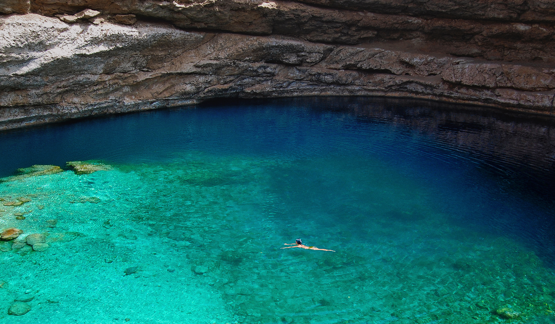 Bimmah Sinkhole, Oman. The Top 10 Things To Do in Oman. Photo by © TravelPlusStyle.com