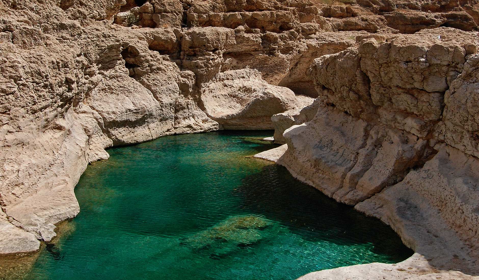 Wadi Shab, Oman. The Top 10 Things To Do in Oman. Photo by © TravelPlusStyle.com