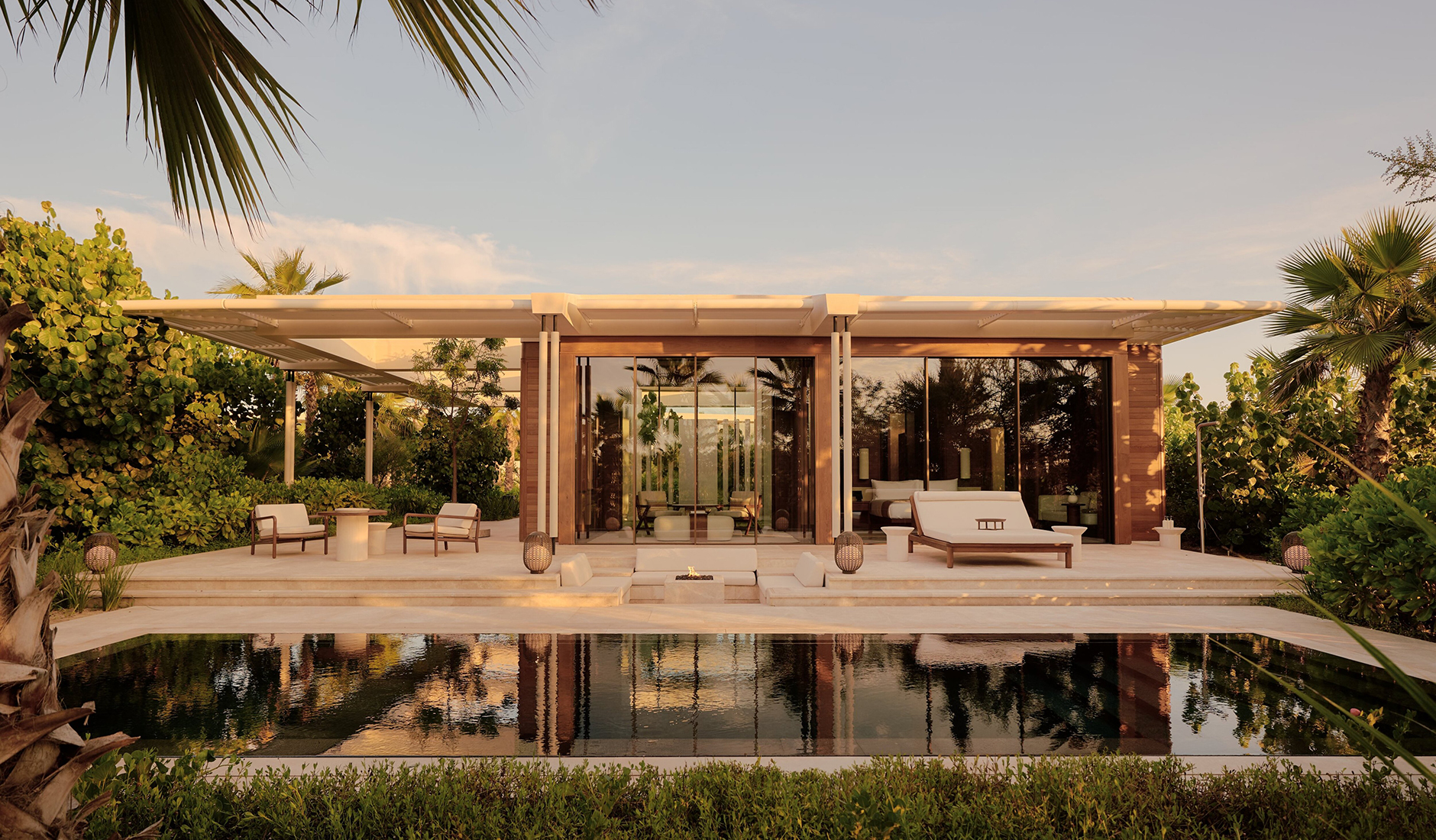 Ultra-luxury beachfront villa at Amanvari resort in Mexico, showcasing modern organic architecture right on the white sand beach of the East Cape.