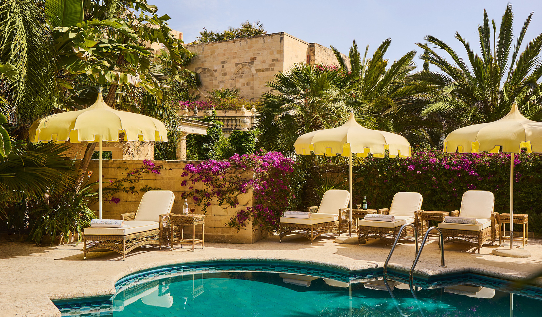 Swimming pool surrounded by greenery at Casa Bonavita in Attard, Malta.