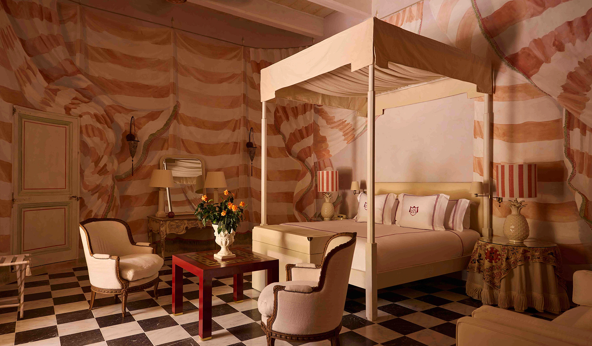 Guest bedroom with classic furnishings and decorative textiles at Casa Bonavita, Malta.