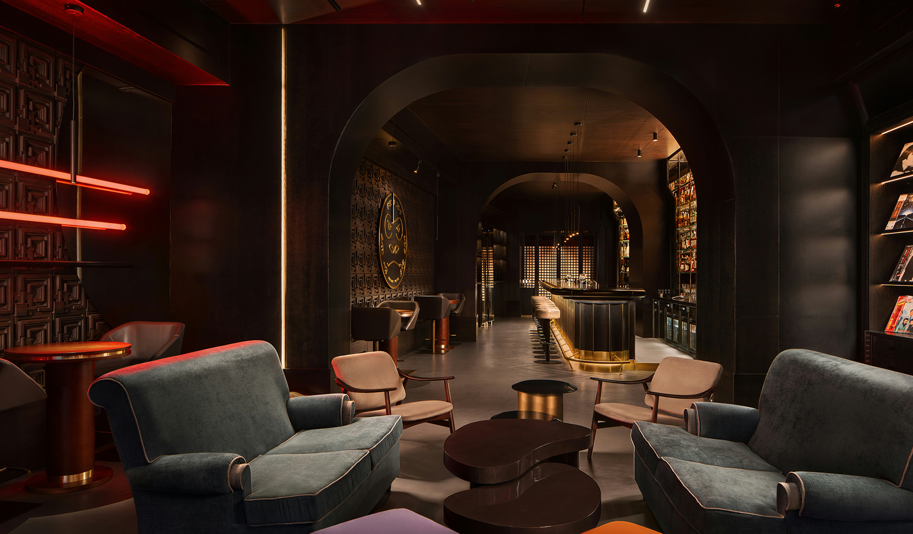 Interior of Drink Kong Bar at Casa J.K. Place Roma, featuring a sophisticated blend of modern and retro design