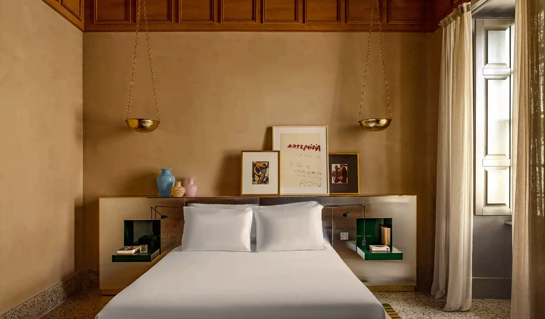 King bedroom in the Grande Ludovisi Junior Suite Signature at Experimental Roma