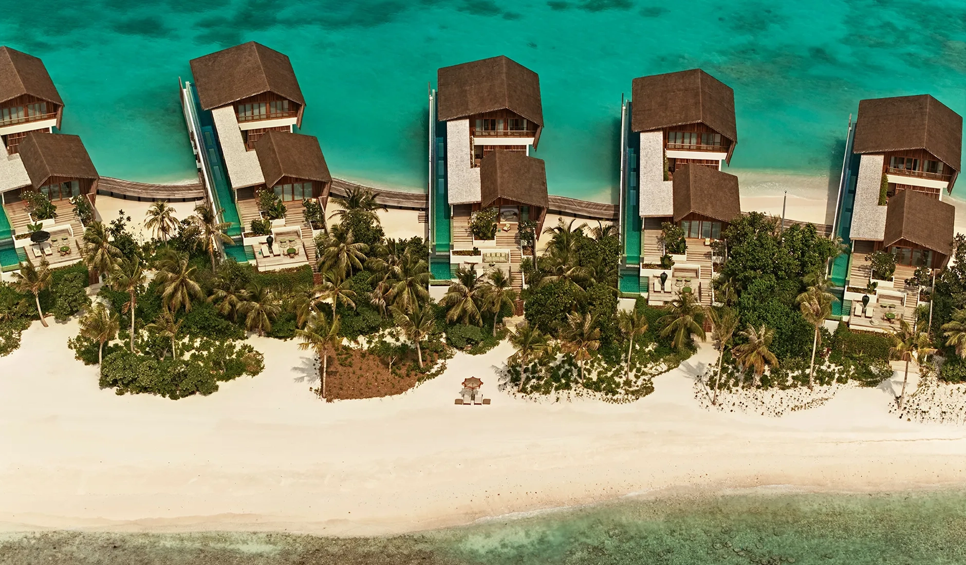 Exterior of a luxury private villas at .Here Baa Atoll surrounded by tropical greenery