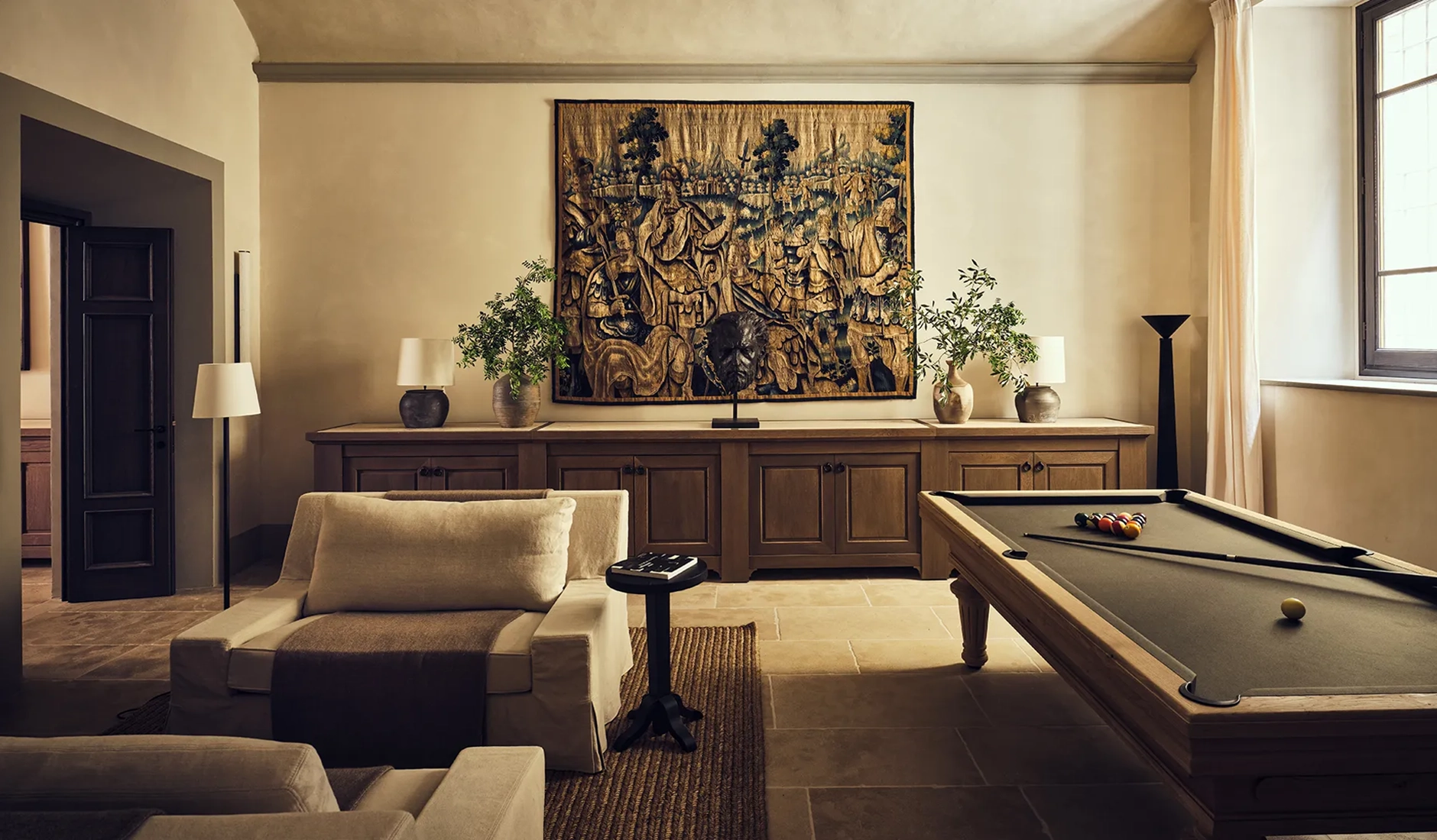 Billiards room at La Réserve Firenze, one of the shared spaces available to residents