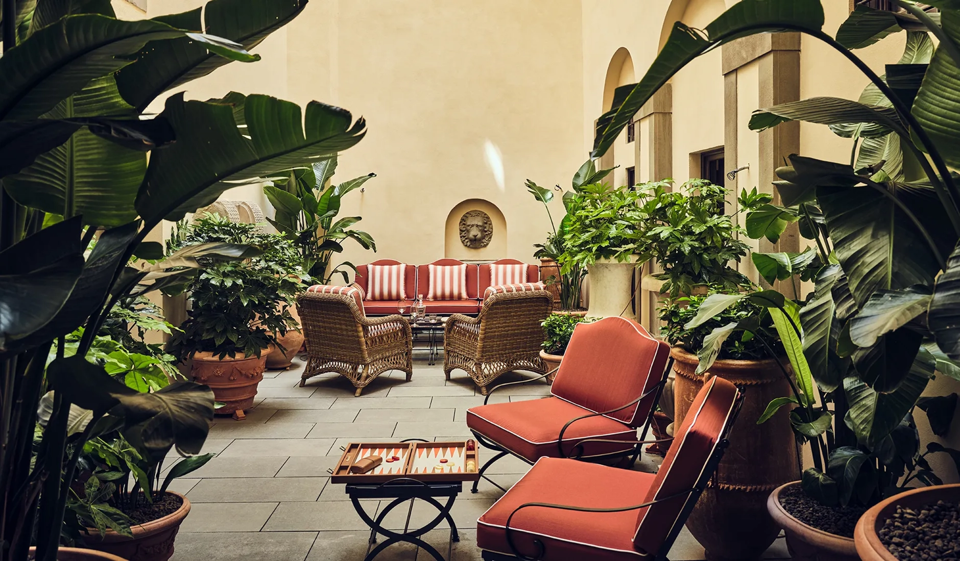 Inner courtyard patio at La Réserve Firenze surrounded by historic palazzo architecture