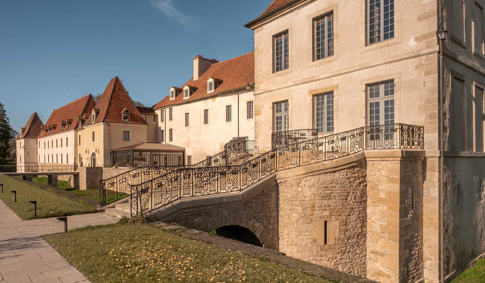 Historic stone façade of Les Sources de Vougeot at Château de Gilly