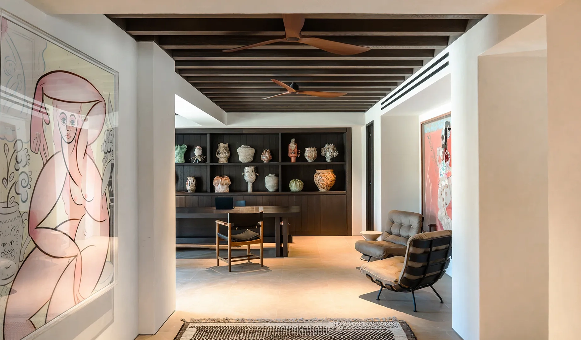 Contemporary lounge space at Luura Cliff with natural materials and understated furnishings