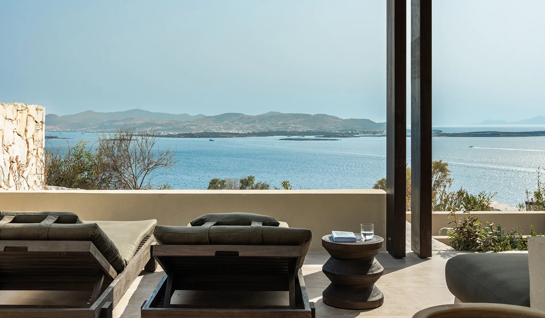 Sun loungers beside a private pool on a Luura Cliff suite terrace