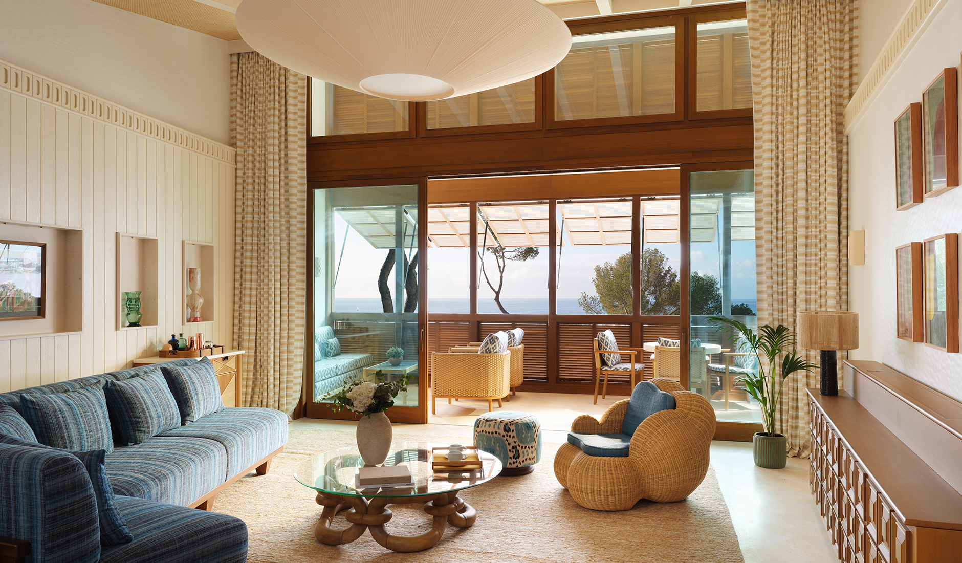 Bright and sophisticated interior of a luxury sea-view suite at Mandarin Oriental Punta Negra, featuring modern Balearic-inspired decor and a private terrace.