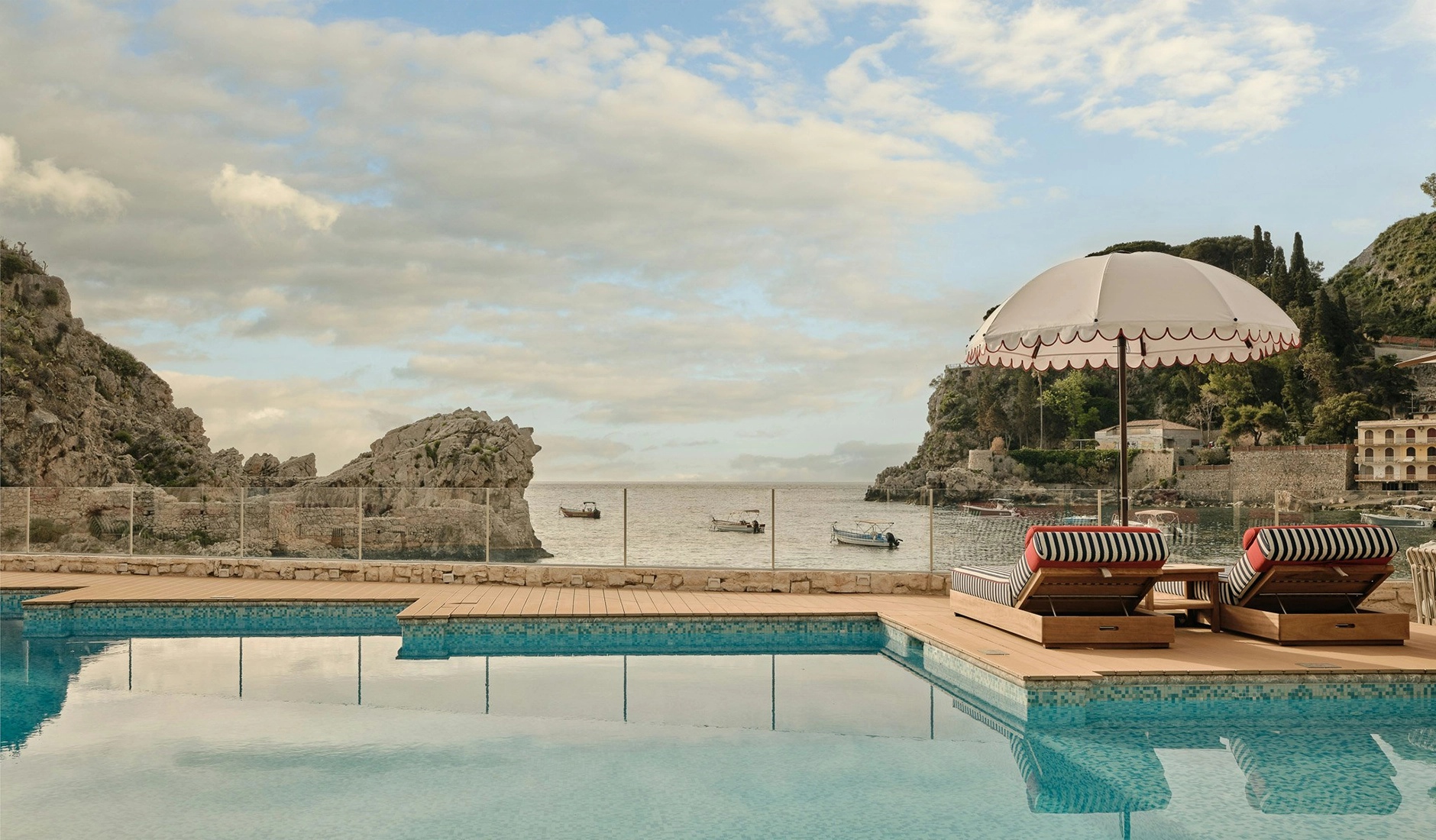 Swimming pool overlooking the sea at Mazzarò Sea Palace