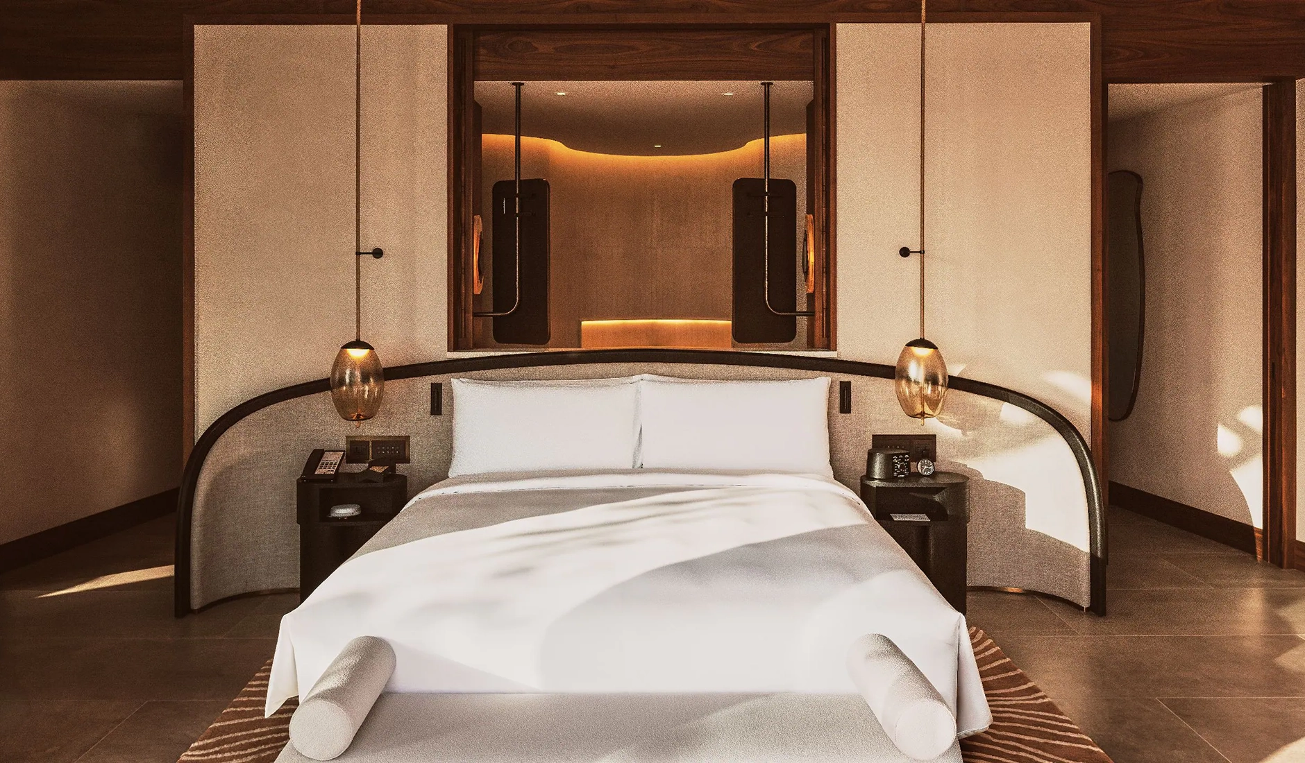 Bedroom inside a private villa at Miraval The Red Sea, with contemporary furnishings and a restful palette