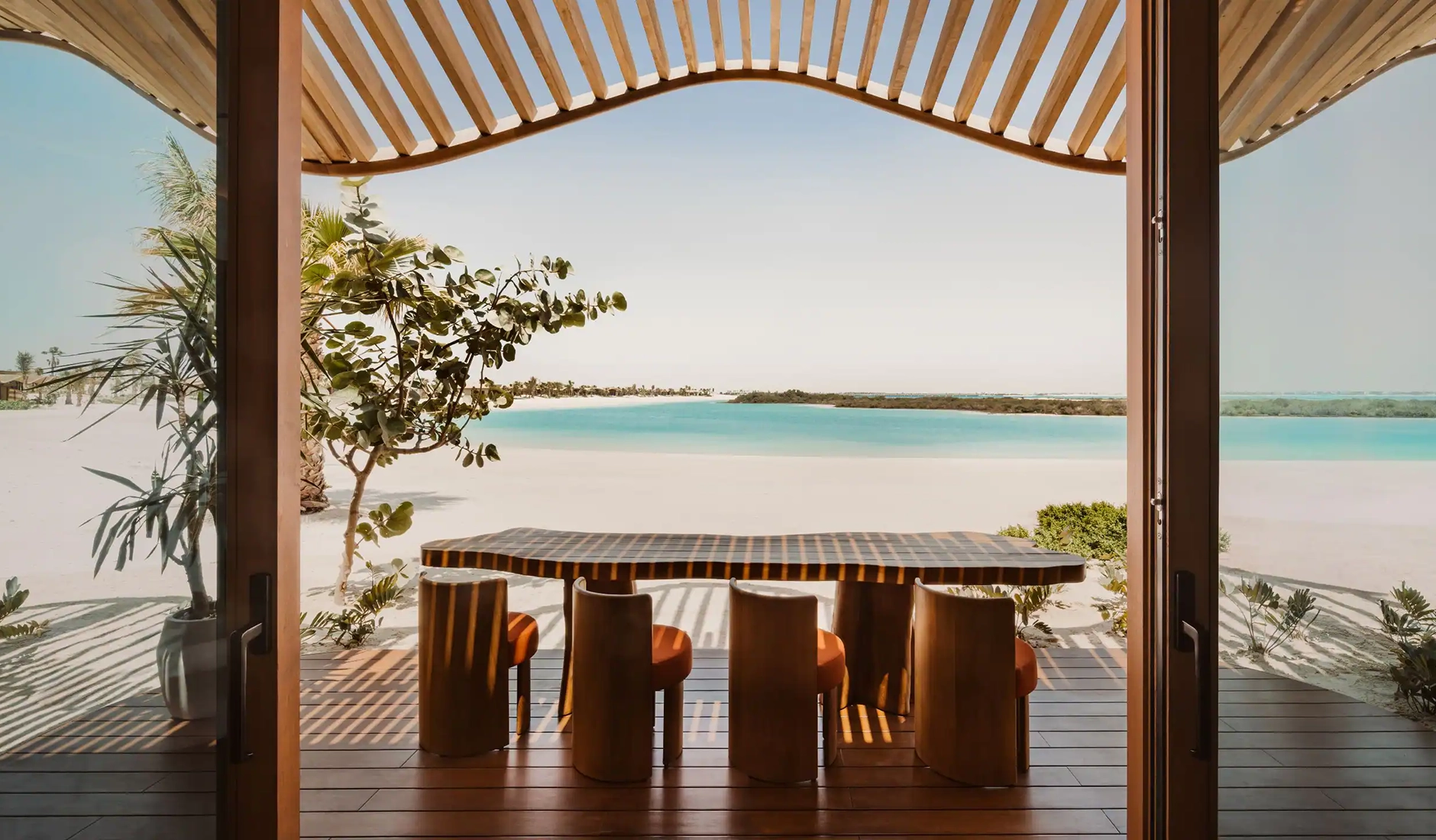 Outdoor terrace at a private villa at Miraval The Red Sea overlooking the coastal landscape