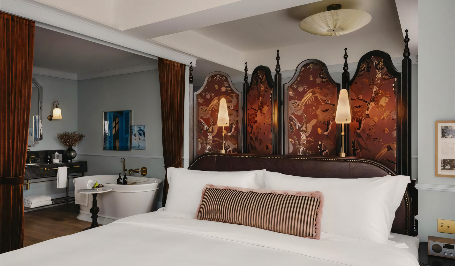 Guest room at NoMad Singapore with Art Deco-inspired interiors